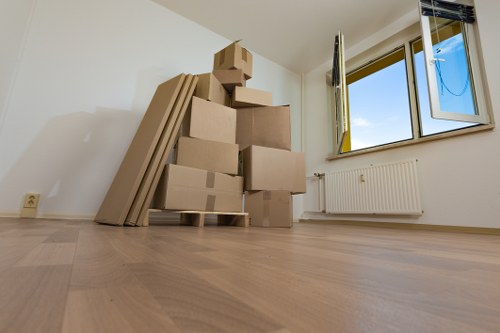 Packers handling furniture and boxes for a local move