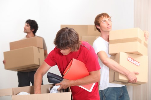 Moving crew handling office equipment with care