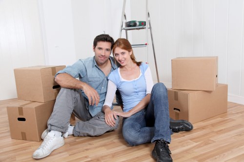Collection vehicle and movers at a Balham residential property